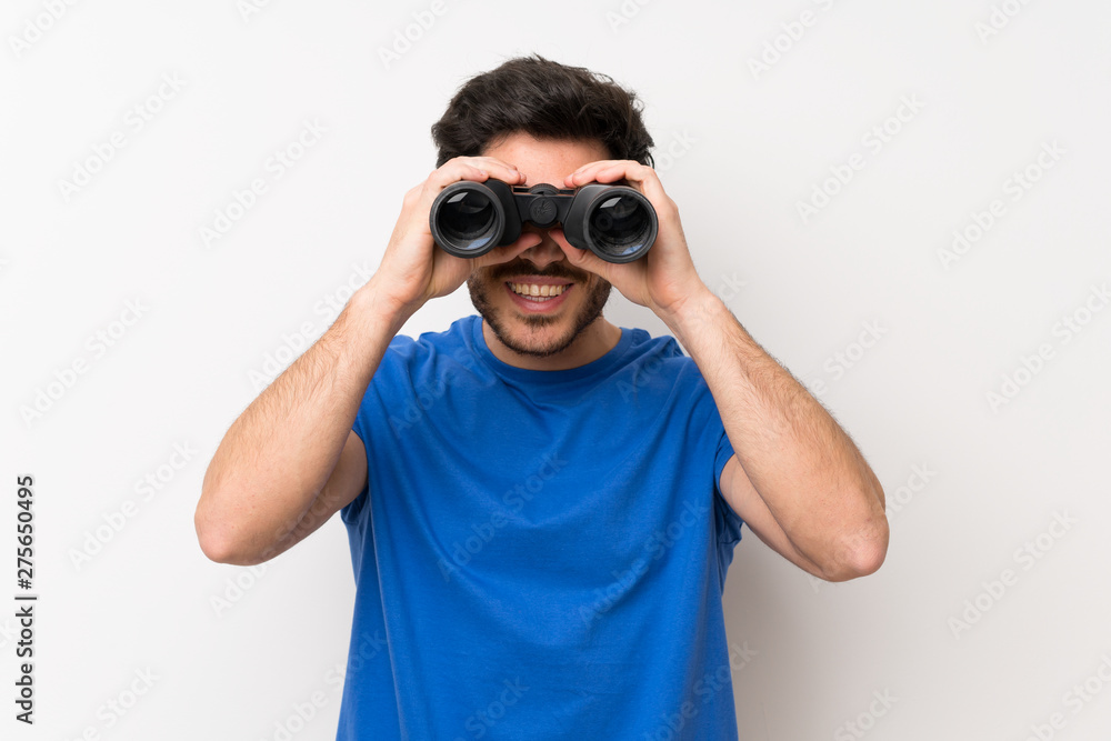 Handsome man with black binoculars Handsome man with black binoculars