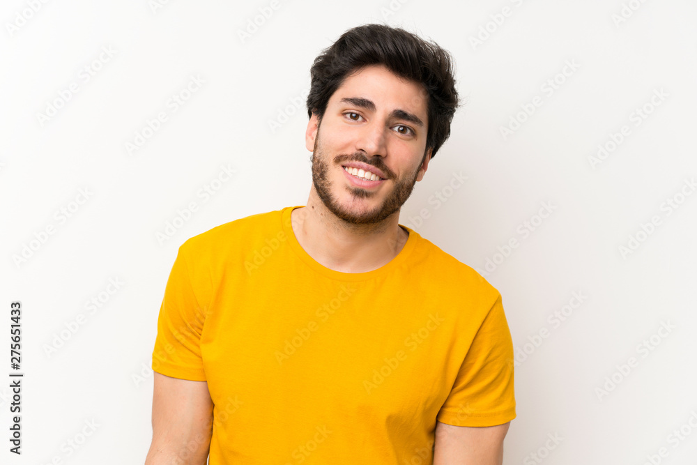 Handsome over isolated white wall laughing Handsome over isolated white wall laughing