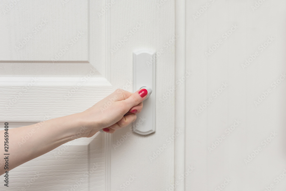 female hand, open door, front view, background, copy space, for advertising, slogan, close up female hand, open door, front view, background, copy space, for advertising, slogan, close up