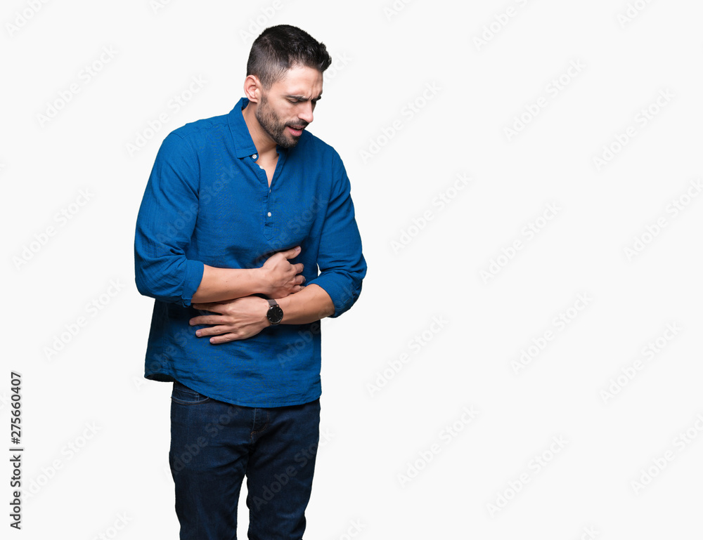 Young handsome man over isolated background with hand on stomach because indigestion, painful illness feeling unwell. Ache concept. Young handsome man over isolated background with hand on stomach because indigestion, painful illness feeling unwell. Ache concept.