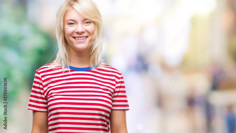 Fototapeta premium Young beautiful blonde woman over isolated background with a happy and cool smile on face. Lucky person.