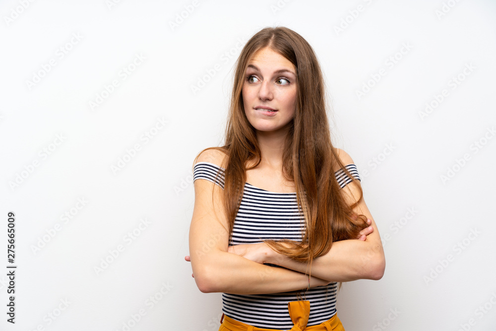 Young woman with long hair over isolated white wall with confuse face expression Young woman with long hair over isolated white wall with confuse face expression