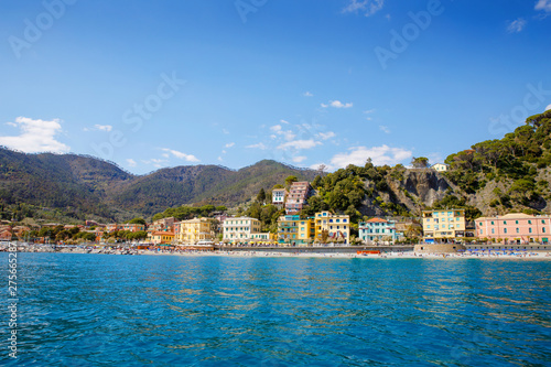 Fototapeta Naklejka Na Ścianę i Meble -  Liguria, Italy coastline of Riviera with colorful houses on sunny warm day. Monterosso al Mare, Vernazza, Corniglia, Manarola and Riomaggiore, Cinque Terre National Park UNESCO World Heritage