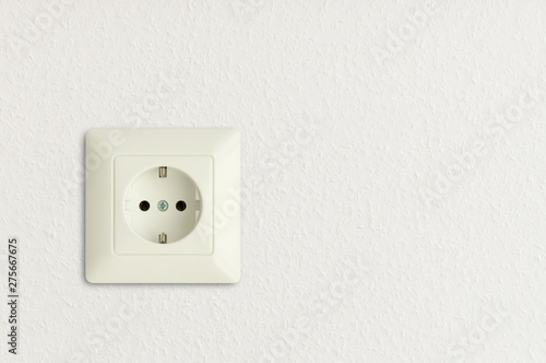 electric power socket on white wall, electrical power outlet, european standard