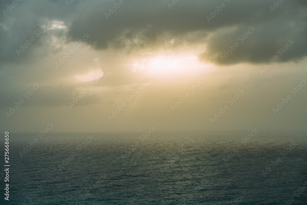 Cloudy sunset sky with ocean