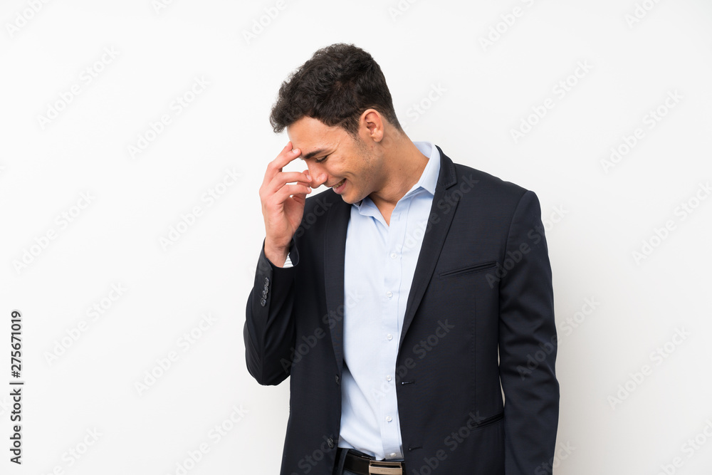 Handsome man over isolated white wall laughing Handsome man over isolated white wall laughing