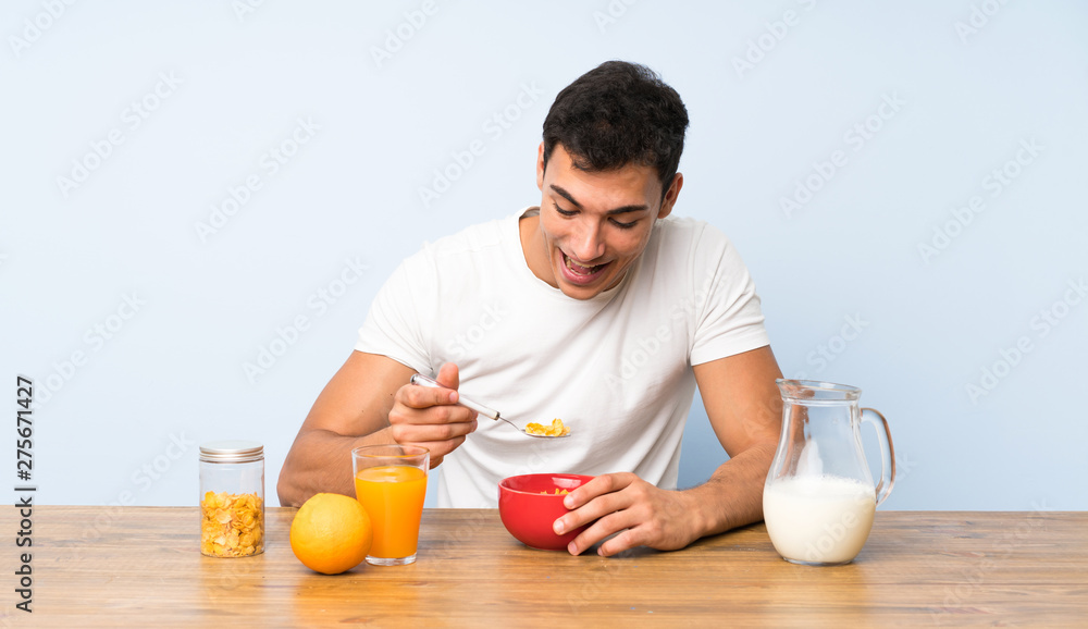 Handsome man in having breakfast Handsome man in having breakfast