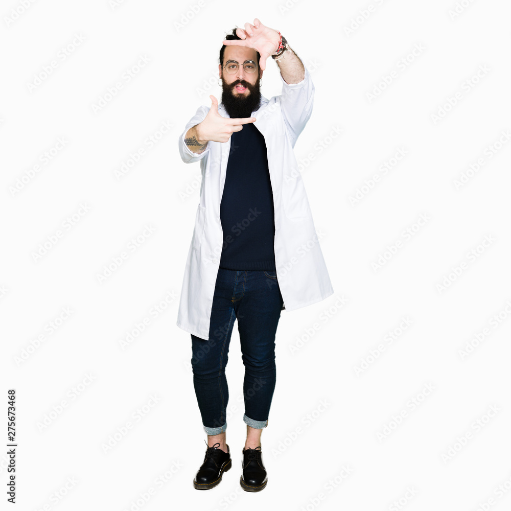 Doctor therapist man with long hair and bear wearing white coat smiling making frame with hands and fingers with happy face. Creativity and photography concept. Doctor therapist man with long hair and bear wearing white coat smiling making frame with hands and fingers with happy face. Creativity and photography concept.