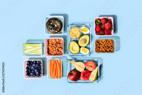 Healthy food concept, lunch boxes filled with fresh snacks
