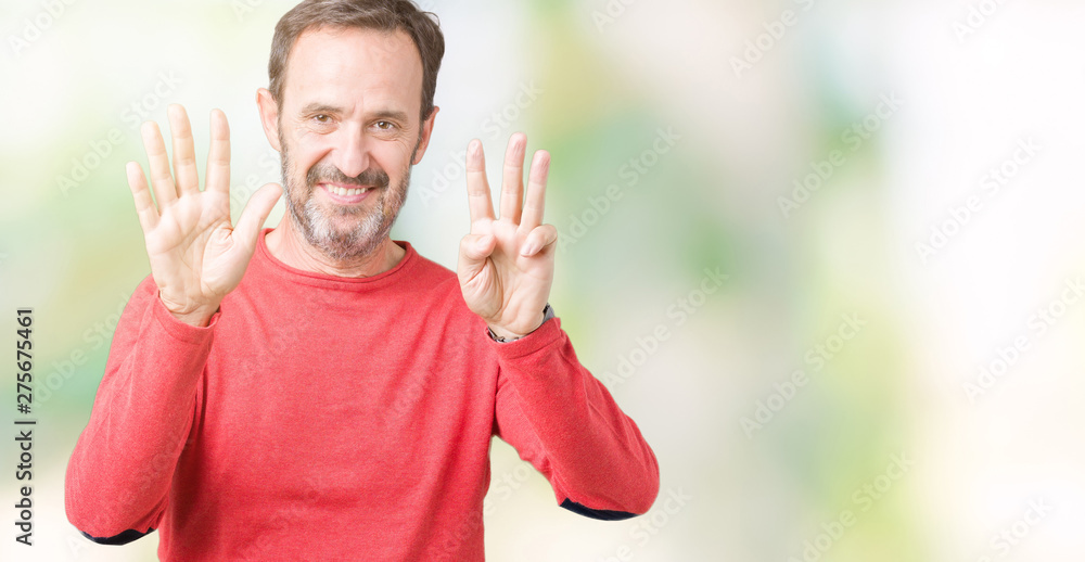 Handsome middle age hoary senior man wearing winter sweater over isolated background showing and pointing up with fingers number eight while smiling confident and happy. Handsome middle age hoary senior man wearing winter sweater over isolated background showing and pointing up with fingers number eight while smiling confident and happy.