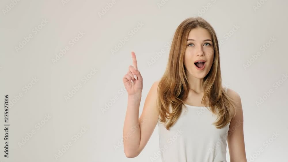 Cute pretty girl found an unexpected solution, has original idea, happy because of remembering something important slow motion Cute pretty girl found an unexpected solution, has original idea, happy because of remembering something important slow motion