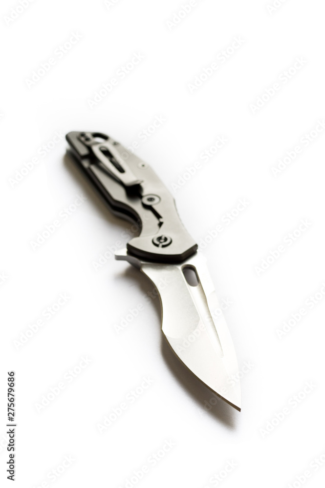 The knife in the center of the frame on a white background. Knife at an angle. The knife in the center of the frame on a white background. Knife at an angle.