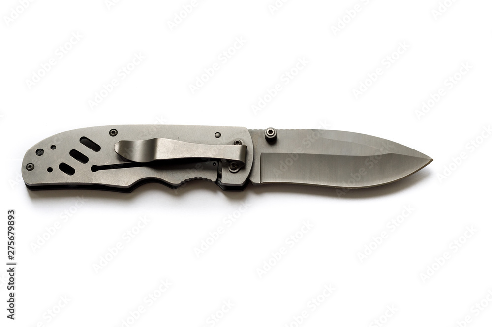 The aluminum handle of the knife with a clip and holes. The aluminum handle of the knife with a clip and holes.