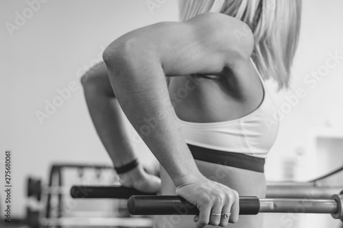 the girl does exercises on simulators photo