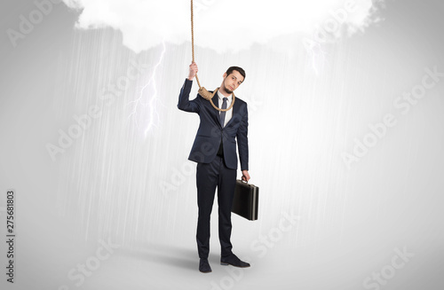 Young businessman trying to suicide with pointing hands concept
 photo