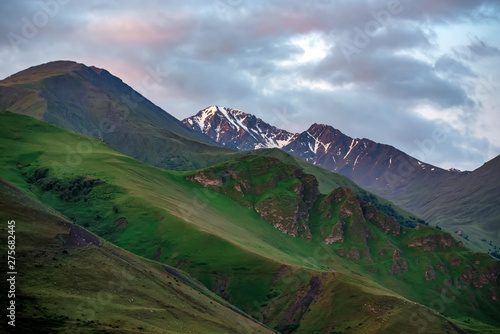 View of beautiful mountains in northern caucasus with cloudy sky