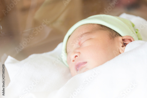Selective focus of newborn baby boy sleeping