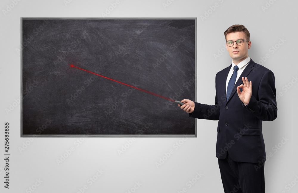 Handsome young teacher with laser pointer teaching
Handsome young teacher with laser pointer teaching