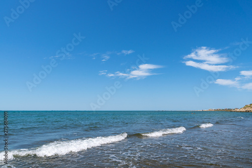 Horizon line over the blue sea