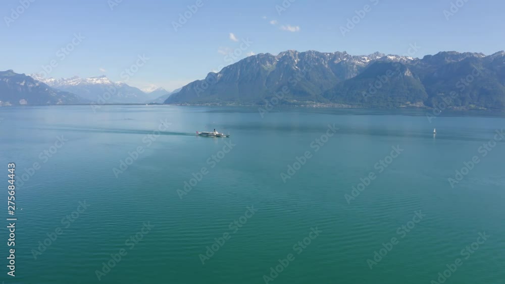 Aerial lateral flight above Lake Leman, following Belle-Epoque steamboat. Switzerland Aerial lateral flight above Lake Leman, following Belle-Epoque steamboat. Switzerland