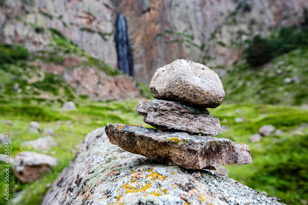 Stone tower of small rocks made in beautiful mountains Stone tower of small rocks made in beautiful mountains