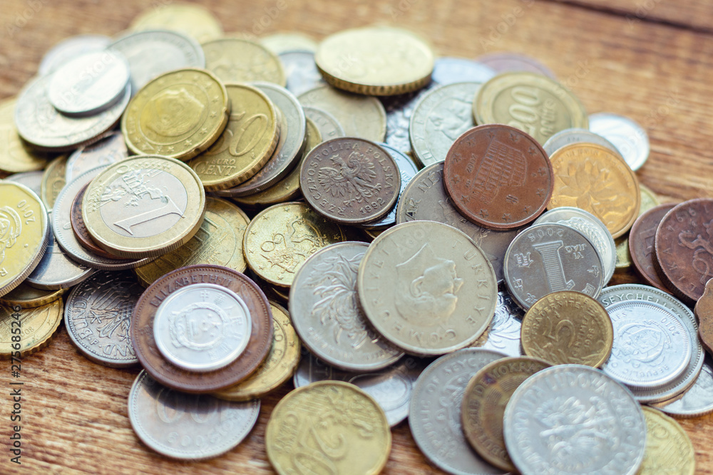 coins old rusty brass euro Seychelles Bulgaria China Germany pile pack heap stack on a wooden background finance economy investment savings concept mock up selective focus close up coins old rusty brass euro Seychelles Bulgaria China Germany pile pack heap stack on a wooden background finance economy investment savings concept mock up selective focus close up