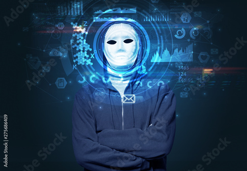 Facial recognition system. Young man on dark background  face recognition concept