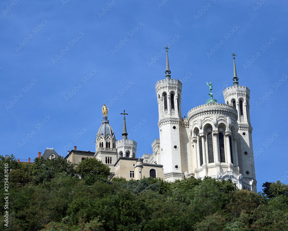 white basilica called notre dame de fourviere with bell towers L white basilica called notre dame de fourviere with bell towers L