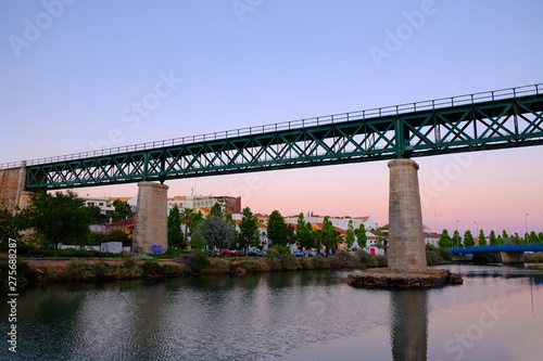 View on the iron bridge in Tavira and the river Gilao, Algarve; Portugal.