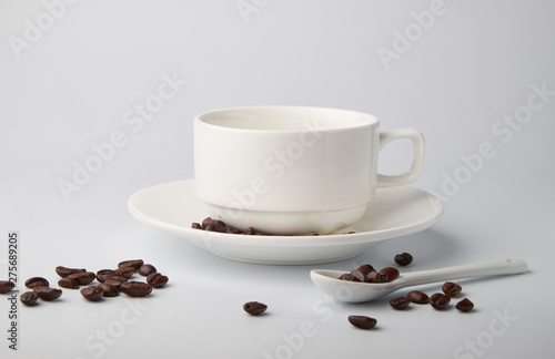 aromatic roasted coffee beans on white background