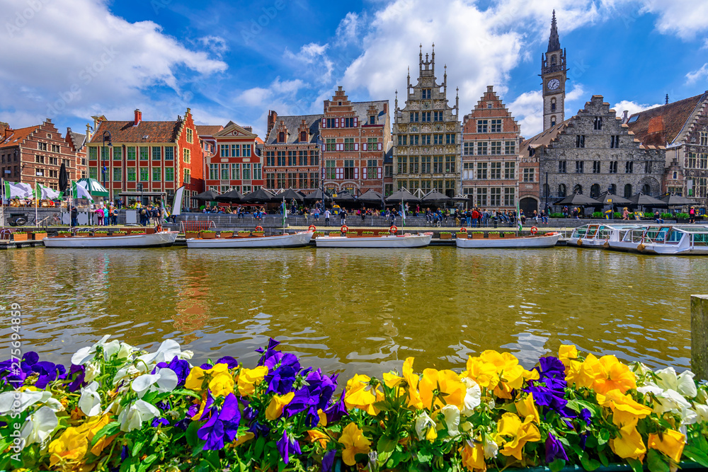 View of Graslei, Korenlei quays and Leie river in the historic city center in Ghent (Gent), Belgium. Architecture and landmark of Ghent. Cityscape of Ghent.