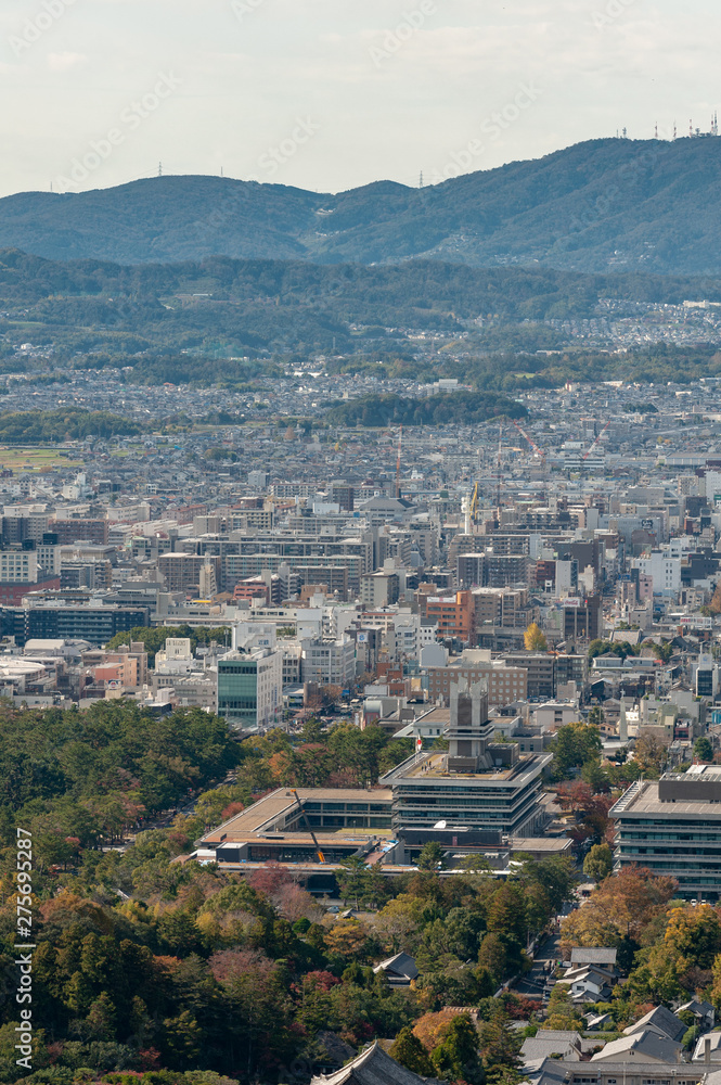 Nara city in Japan from the hill in sunny day. Nara city skyline in Japan with a buildings and streets