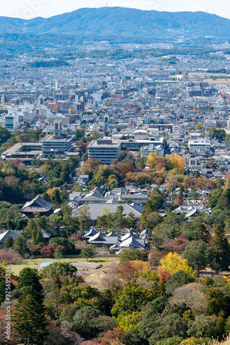 Nara city in Japan from the hill in sunny day. Nara city skyline in Japan with a buildings and streets