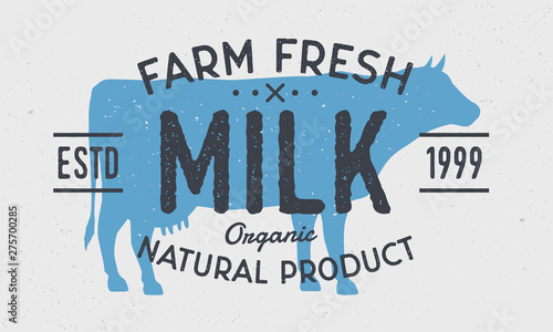 Cow Milk logo. Retro milk logo with cow silhouette. Vintage poster with grunge texture. Farm fresh milk emblem.