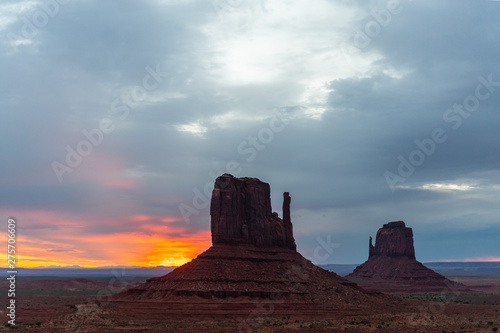 Sunrise over the famous mitten and merrick buttes of Monument Valley