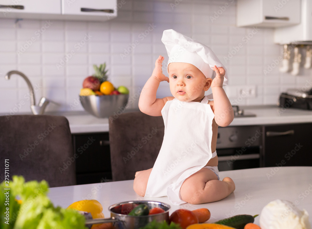 little boy, white chef hat, vegetables little boy, white chef hat, vegetables