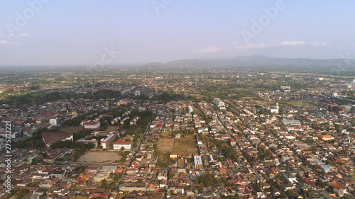 cityscape Yogyakarta with buildings  highway at sunset time. aerial view cultural capital Indonesia yogyakarta located on java island  Indonesia