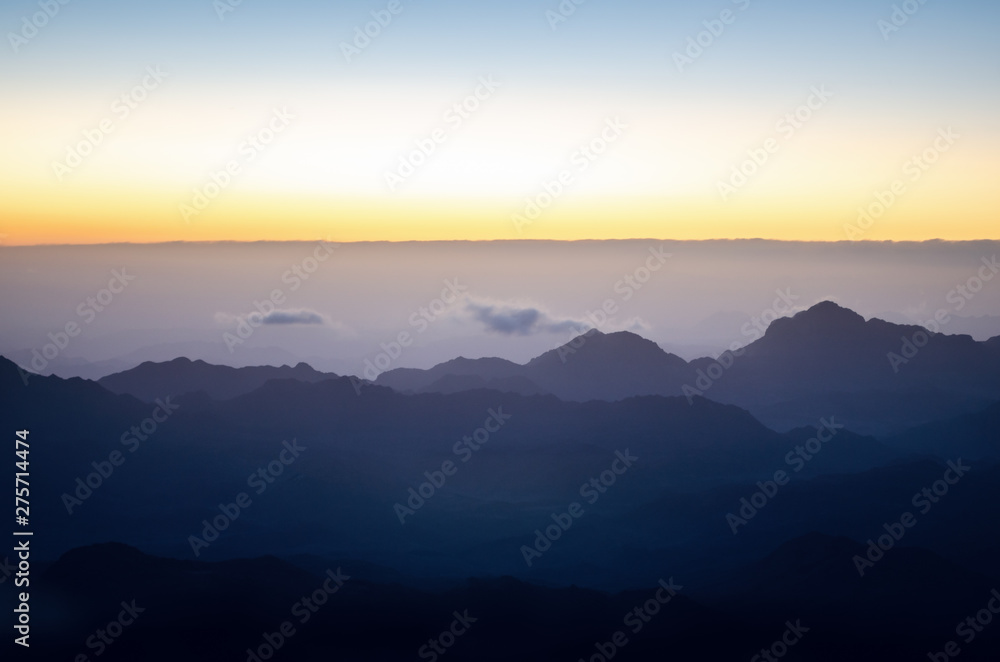 View from the mountain of Moses, a beautiful sunrise in the mountains of Egypt View from the mountain of Moses, a beautiful sunrise in the mountains of Egypt