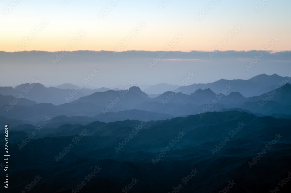 View from the mountain of Moses, a beautiful sunrise in the mountains of Egypt View from the mountain of Moses, a beautiful sunrise in the mountains of Egypt