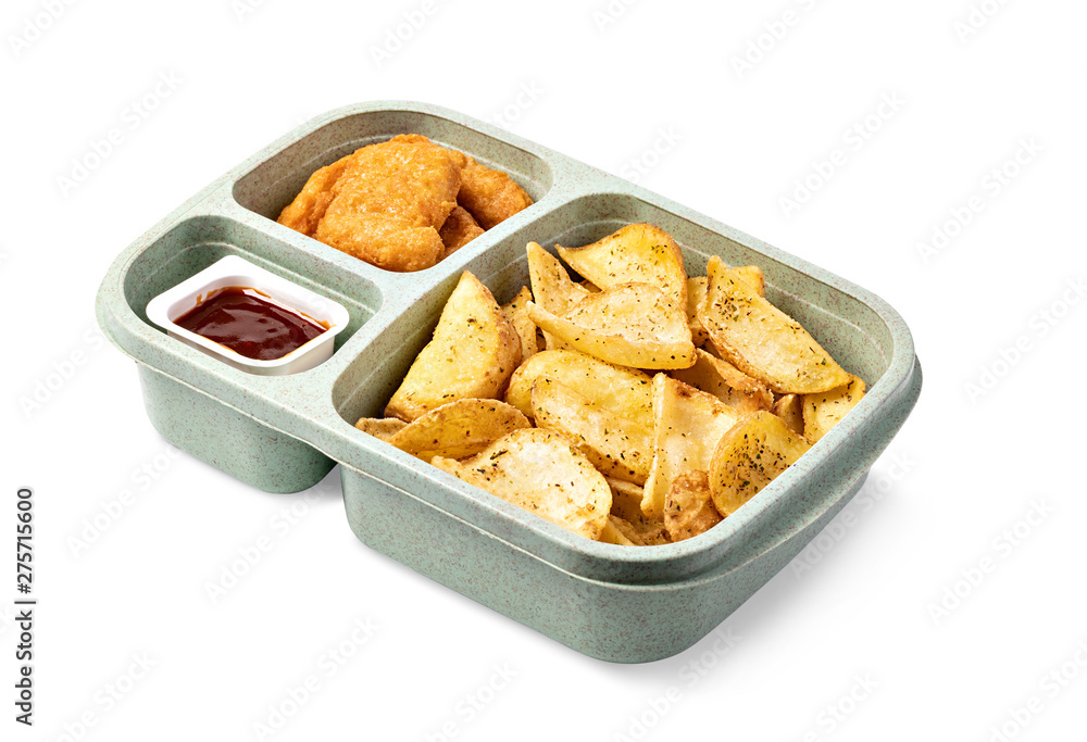 Tasty fried nuggets and potatoes Tasty fried nuggets and potatoes