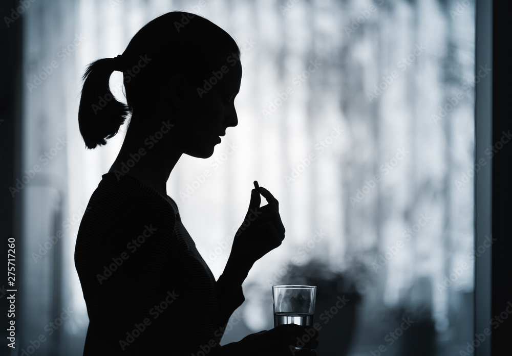 medicine, health care, adiction and people concept - close up of woman taking in pill. medicine, health care, adiction and people concept - close up of woman taking in pill.