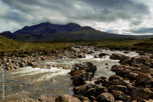 Landscape view of the river and waterfalls, with mountains in the background at Sligachan on the Isle of Skye, north west Scotland, UL.