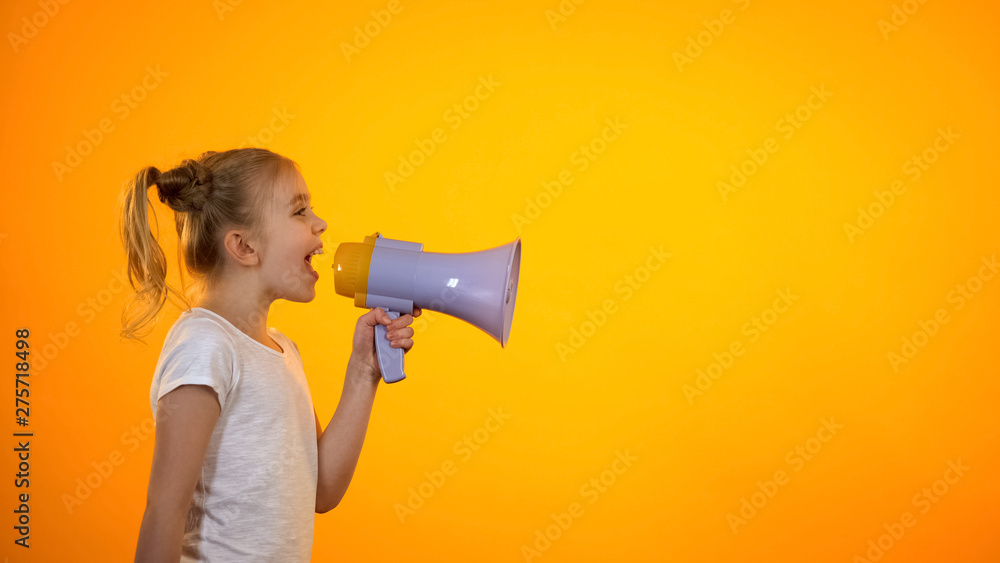Schoolgirl shouting in megaphone, making announcement, sales and discounts Schoolgirl shouting in megaphone, making announcement, sales and discounts
