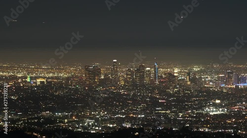 Wallpaper Mural Zoom In Time Lapse of Night Time Los Angeles Skyline with Lights of Planes and Cars Torontodigital.ca