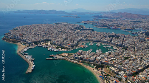 Aerial drone panoramic photo of famous port round port of Mikrolimano and Zea or Passalimani with luxury yachts docked and famous port of Piraeus as seen from great altitude, Piraeus, Attica, Greece © aerial-drone