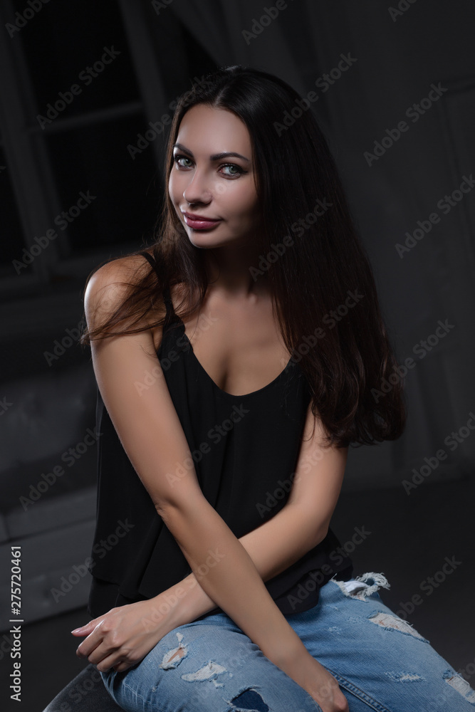 Young alluring lady posing in studio. Young alluring lady posing in studio.
