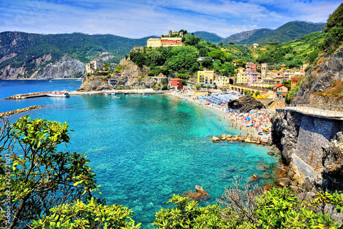 Cinque Terre village of Monterosso, Italy. View of the village over the brilliant blue sea. photo