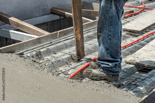 Framework to sustain a cemented covered roof. Construction site with builder