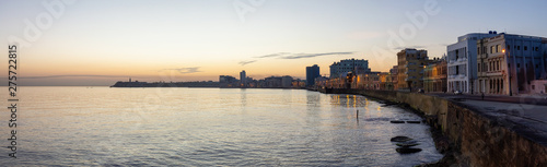 Beautiful panoramic view of the Old Havana City  Capital of Cuba  by the Ocean Coast during a vibrant sunny sunrise.