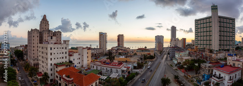 Aerial Panoramic view of the Havana City, Capital of Cuba, during a colorful cloudy sunrise.